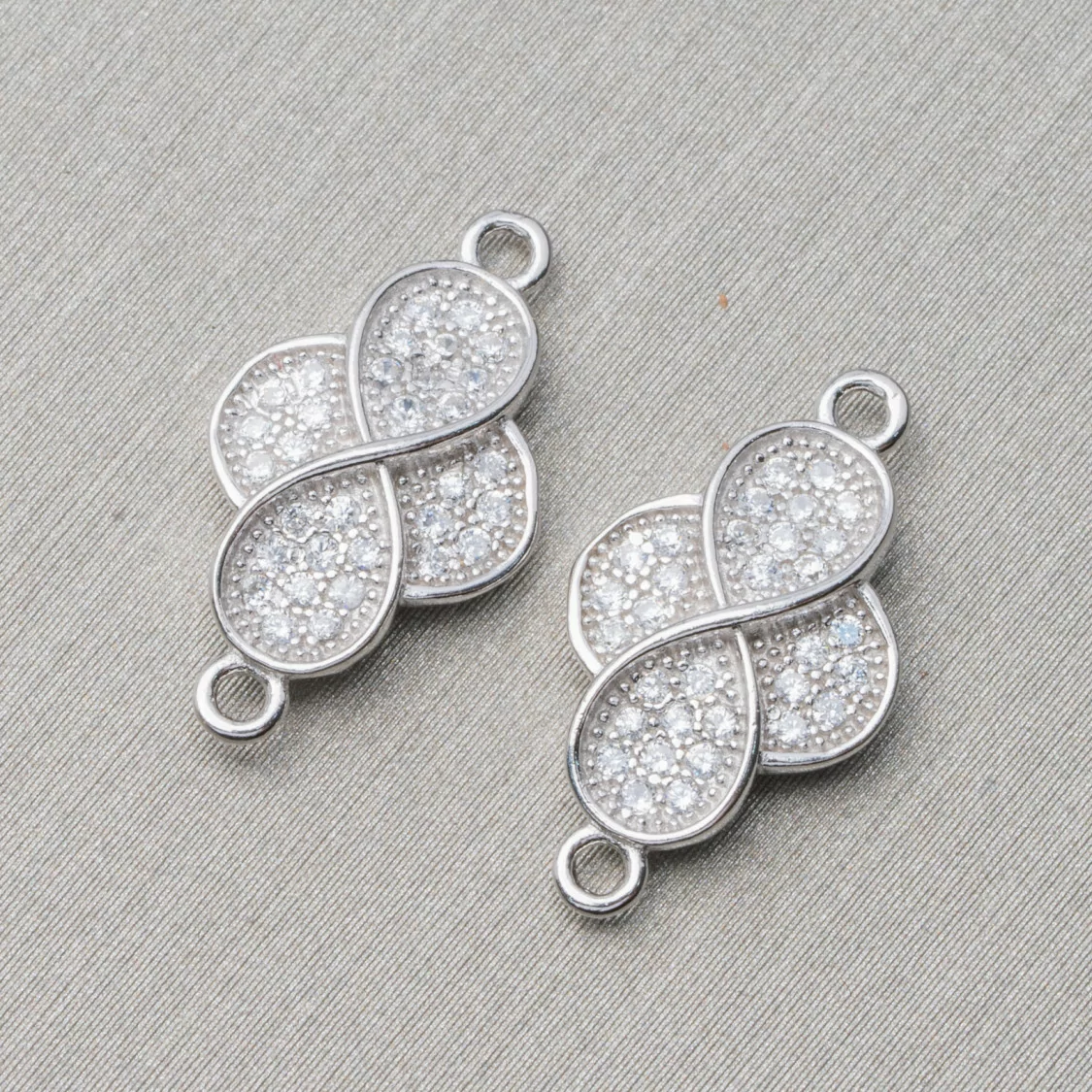 Componente Connettore Di Argento 925 Con Zirconi Infinito Con 2 Anellini 10x13mm 4pz Rodiato-CONNETTORI PAVE' | Worldofjewel.com