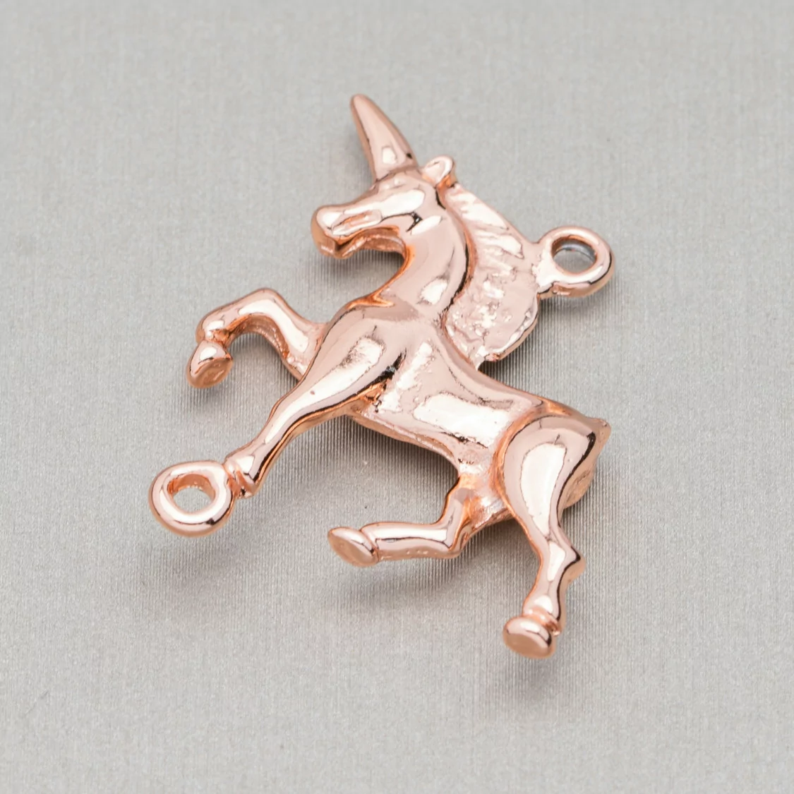 Componenti Di Zama A 2 Anellini Unicorno 24x31mm 20pz Oro Rosa Light-CONNETTORI LISCI | Worldofjewel.com