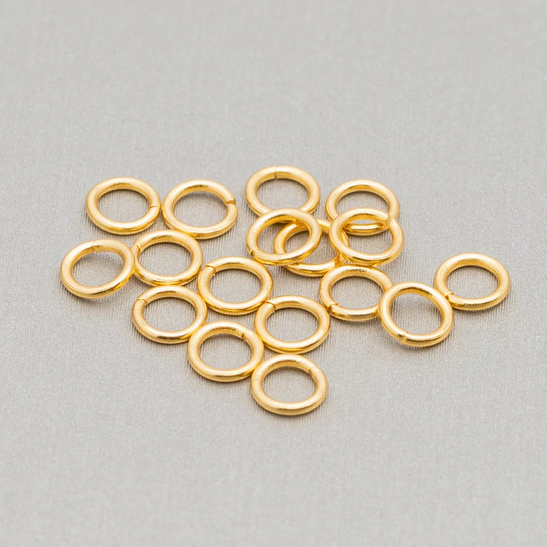 Contromaglia Anellini di Acciaio Aperto 0,8x8mm 50gr Placcato Oro 550pz-ANELLINI APERTI | Worldofjewel.com