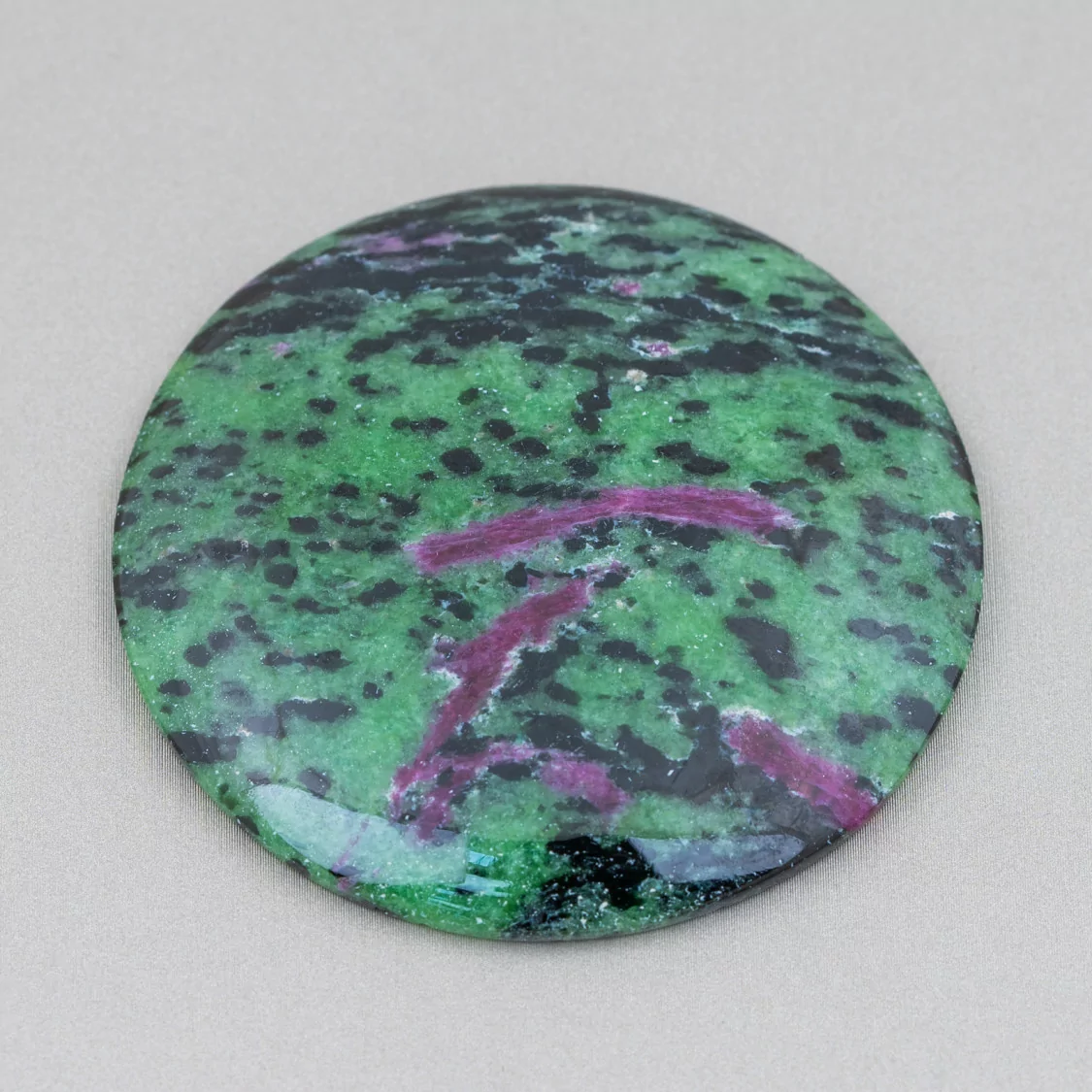 Componente Cabochon Tondo Liscio Rubizoisite 58mm 1pz- CABOCHON GRANDI | Worldofjewel.com