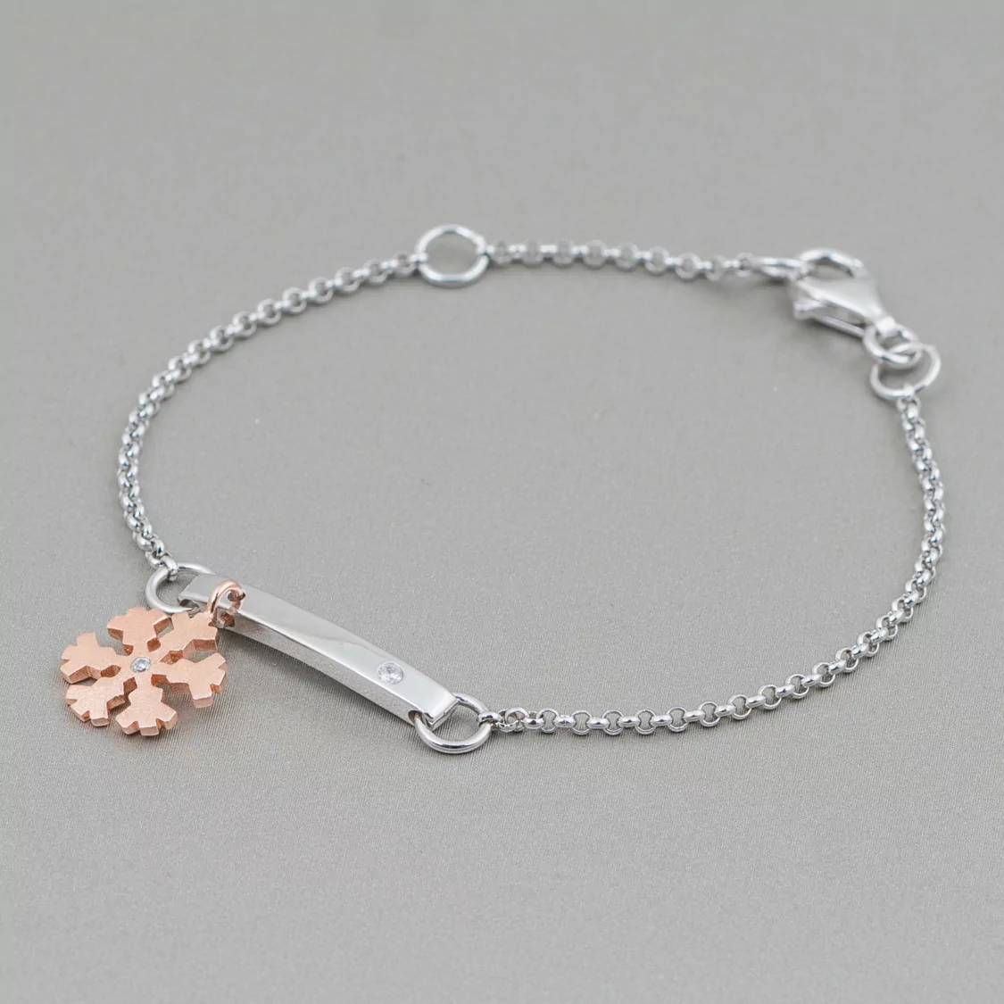 Bracciale Di Argento 925 Design Italy Con Centale Fiocco Di Neve Rose' Lunghezza 19cm-16,5cm Rodiato-BRACCIALI DI ARGENTO 925 | Worldofjewel.com