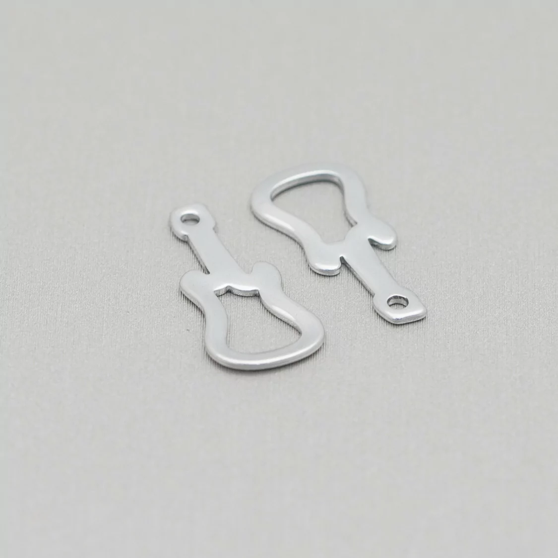 Componente Di Acciaio Chitarra Pendente 09x19mm 120pz-CONNETTORI LISCI | Worldofjewel.com