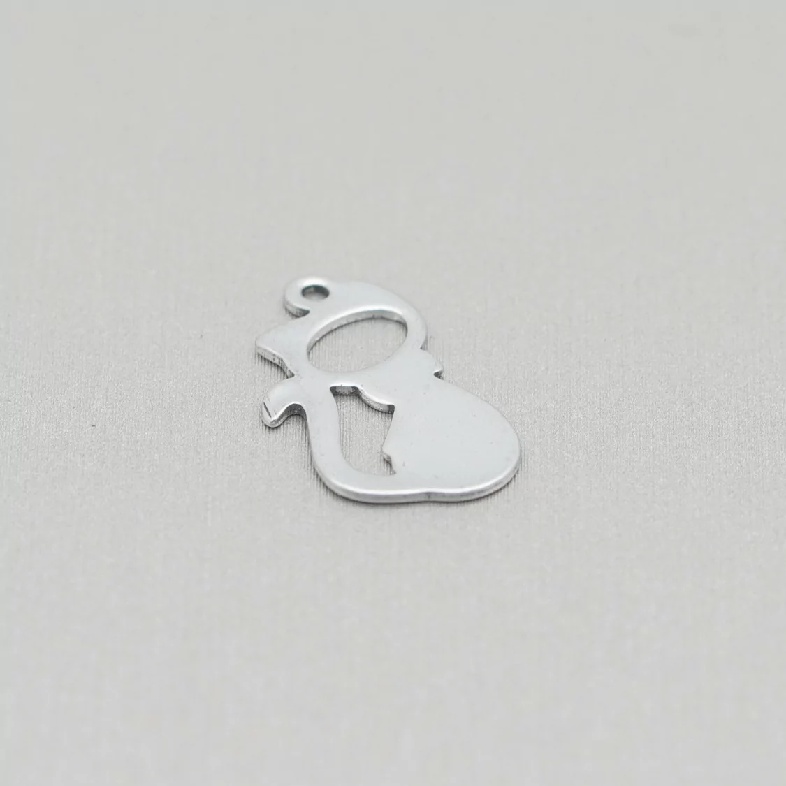 Componente Di Acciaio Gatto Forato Pendente 12x19mm 120pz-CONNETTORI LISCI | Worldofjewel.com