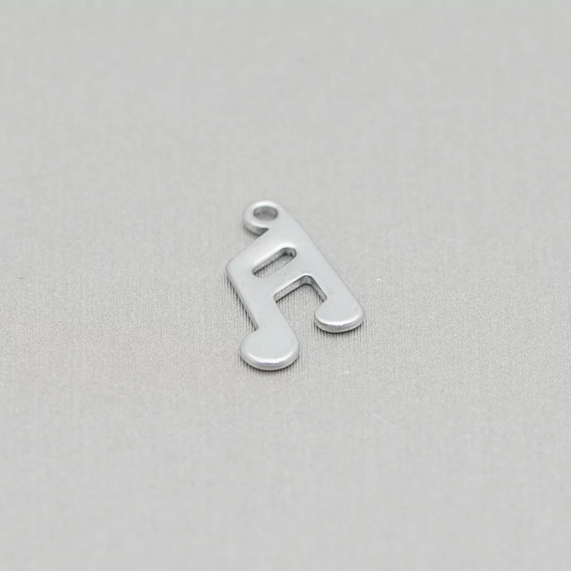 Componente Di Acciaio Nota Musicale Pendente 08x13mm 120pz-CONNETTORI LISCI | Worldofjewel.com