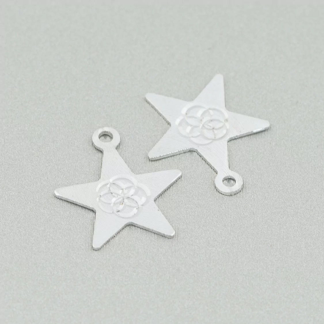 Componente Pendente Di Argento 925 Piastra Lavorata Stella 13x15mm 12pz-CONNETTORI LISCI | Worldofjewel.com