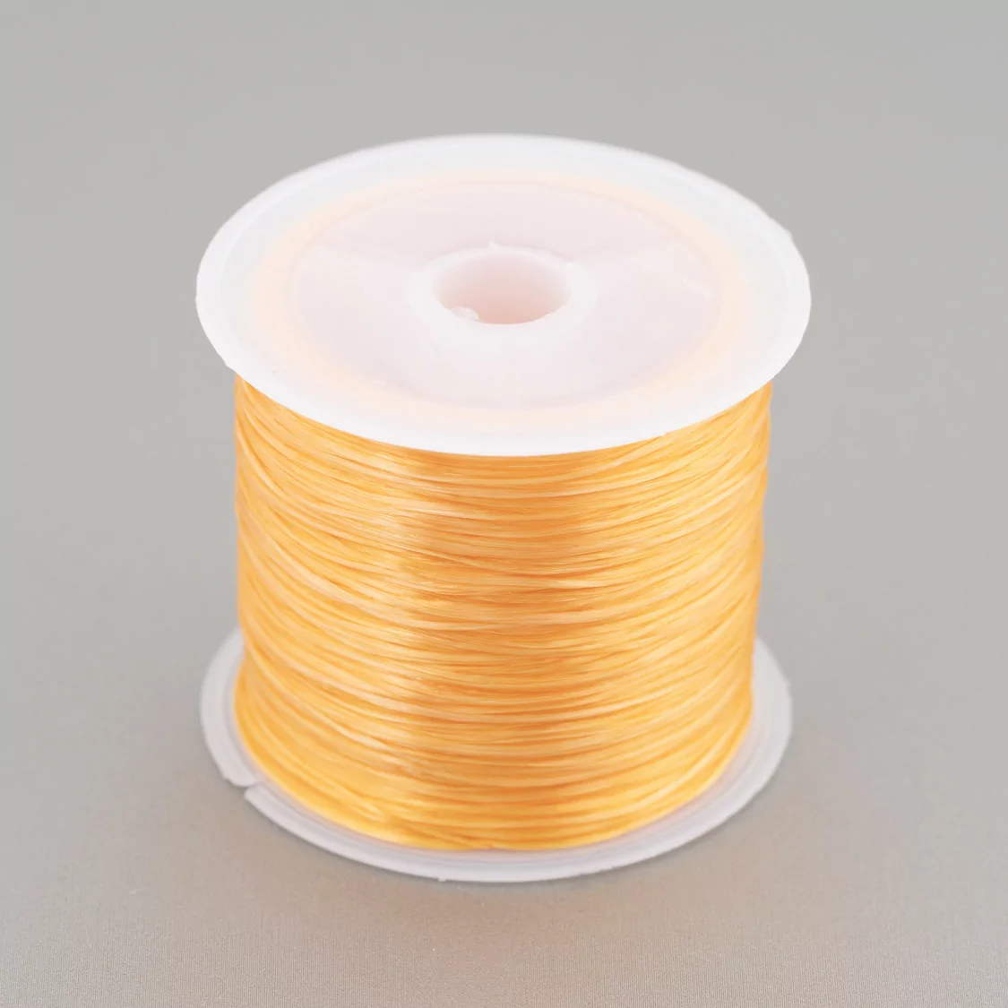 Filo di Elastico Multifilo Misura 0,5mm 30 Metri 1 Bobina Arancio-FILO di ELASTICO | Worldofjewel.com