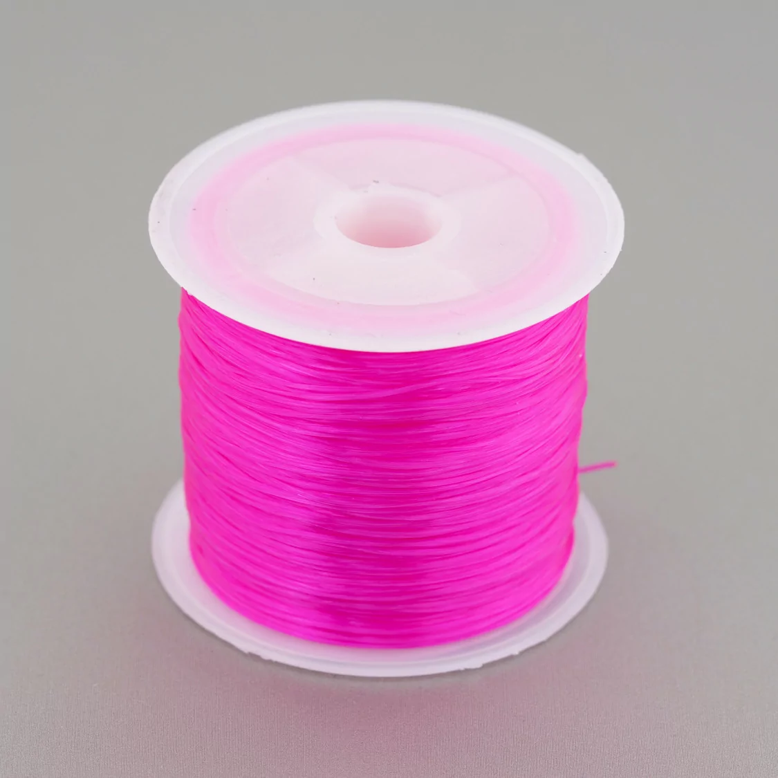 Filo di Elastico Multifilo Misura 0,5mm 30 Metri 1 Bobina Fucsia Intenso-FILO di ELASTICO | Worldofjewel.com