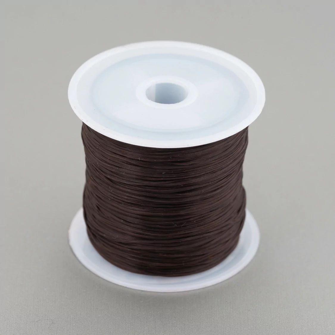 Filo di Elastico Multifilo Misura 0,5mm 30 Metri 1 Bobina Marrone Scuro-FILO di ELASTICO | Worldofjewel.com