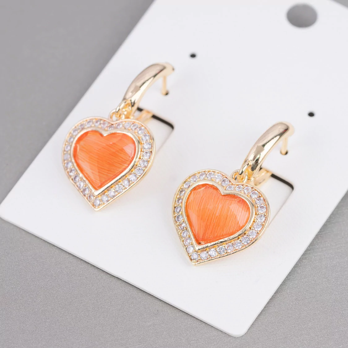 Orecchini Perno Chiuso Di Bronzo Con Zirconi E Occhio Di Gatto Cuore 18x33mm Arancio-BRONZO CRYSTAL | Worldofjewel.com