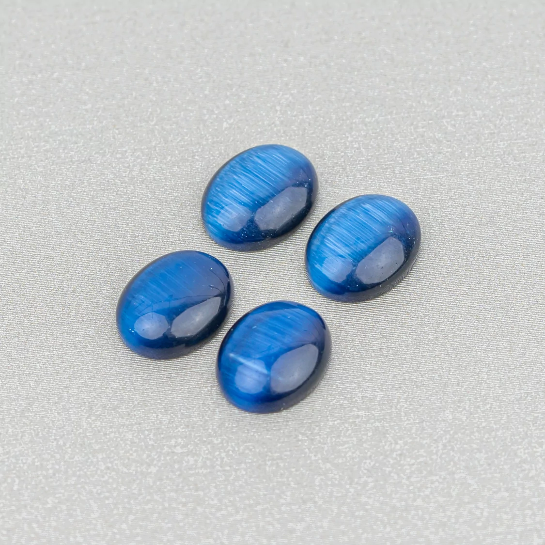 Cabochon Di Occhio Di Gatto Incastonati Ovale 8x10mm 40pz Blu- CABOCHON DI CRISTALLI | Worldofjewel.com