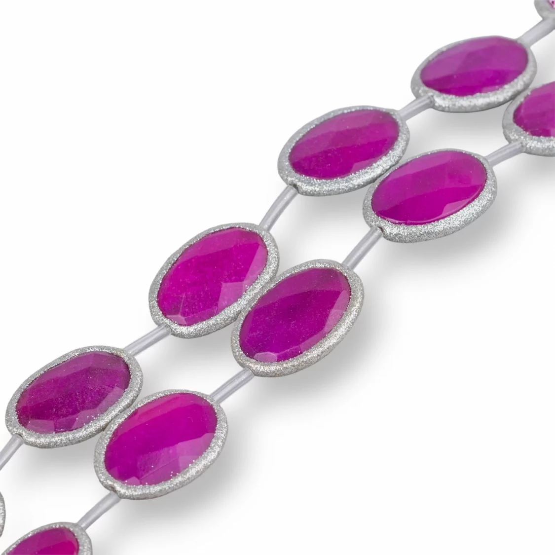 Perline A Filo Di Giada Fucsia Ovale Piatto Sfaccettato Con Glitter 34x44mm 5pz Argentato-PIETRE DURE BORDATE | Worldofjewel.com