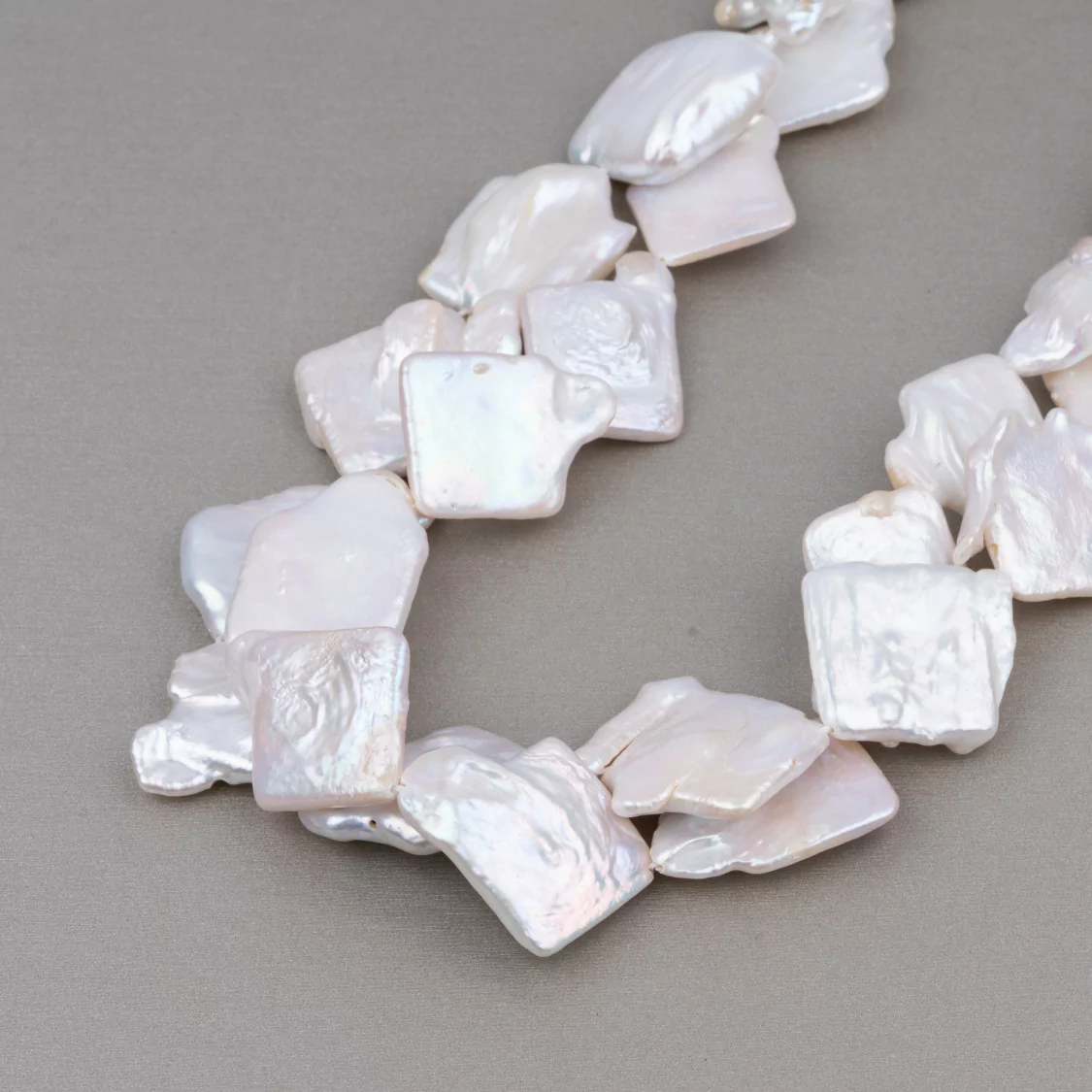 Perle Di Fiume Piatte Rombo (SWG) Bianco 70-80gr-PERLE SCARAMAZZE PIATTE | Worldofjewel.com