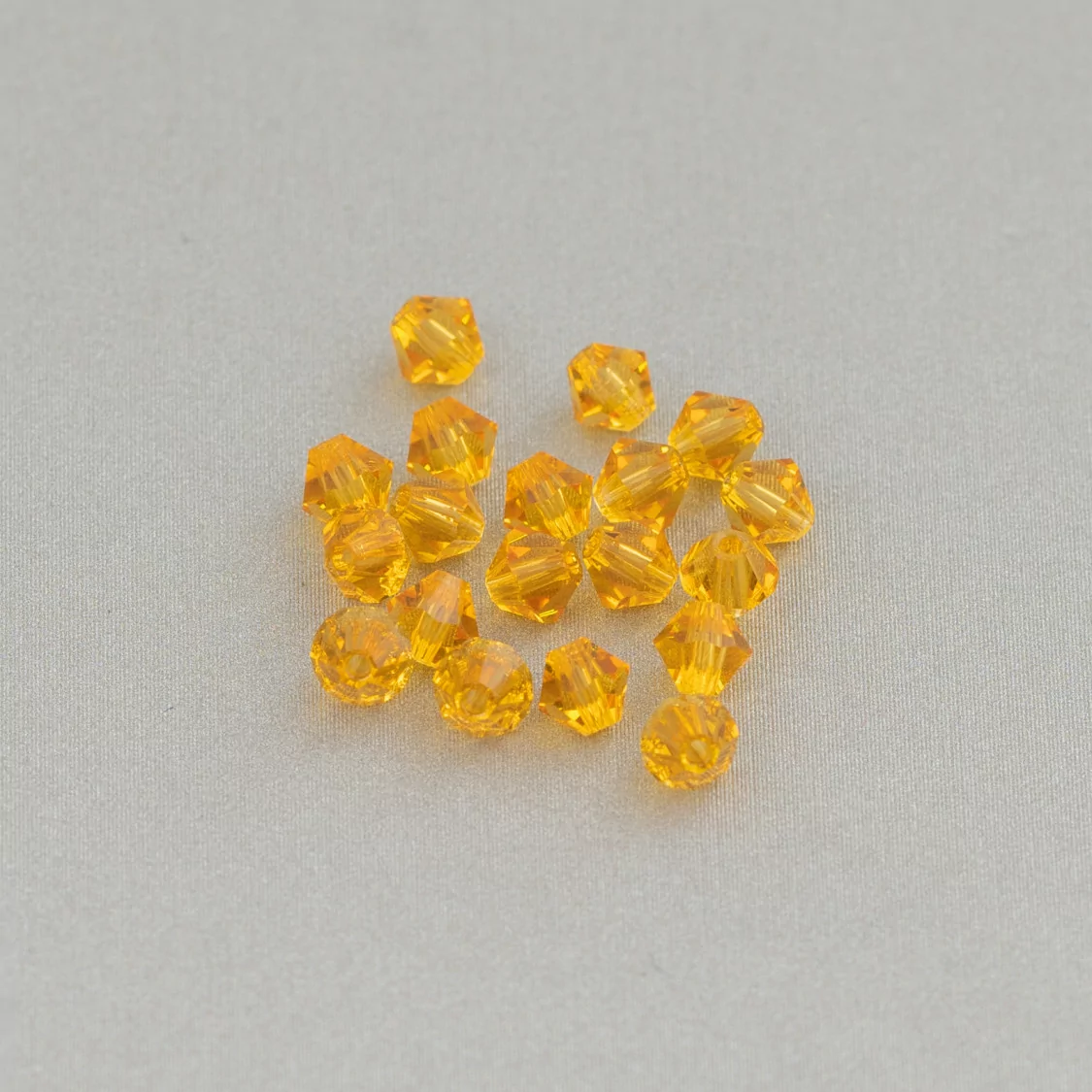 Cristalli Swarovski Bicono 4mm Marca Preciosa - 100pz - Giallo Ocra-CRISTALLI SWAROVSKI | Worldofjewel.com